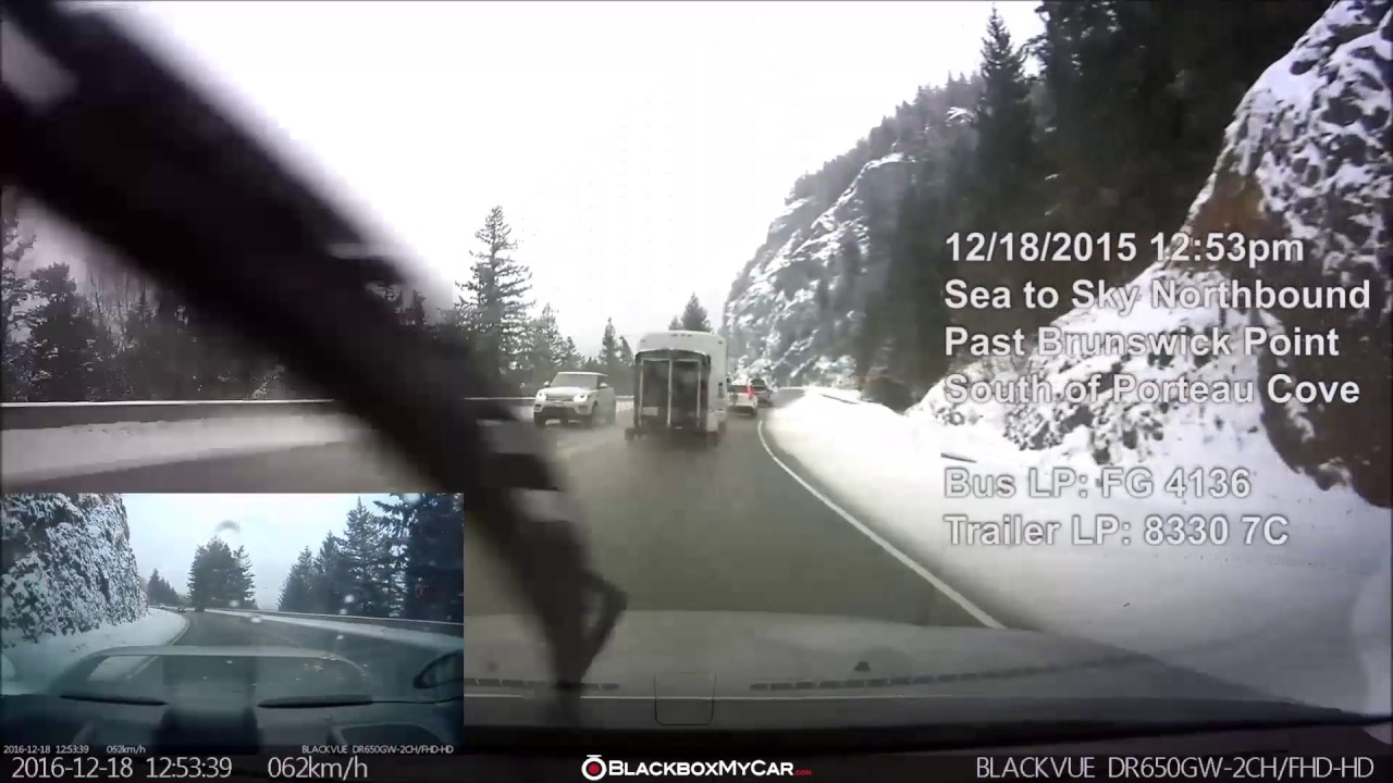 Dangerous Overtaking by a Trailer-Hauling Bus Captured on Dashcam